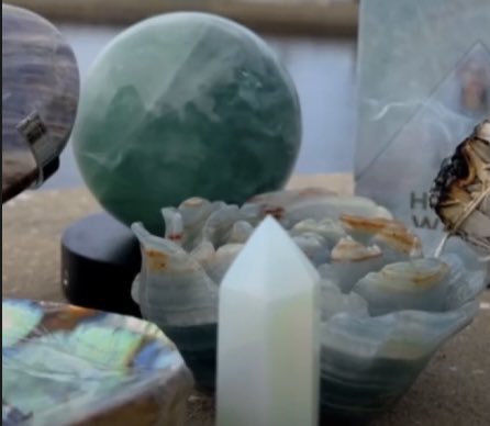 Several Crystals set on a Wall Overlooking a Lake