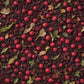 Cherry Goddess Fruity Tea Blend in Cup Loose Leaf Cherry Goddess Fruity Tea Ingredients of Cherry Goddess Fruity Tea Cherry Goddess Fruity Tea in Teapot Hibiscus, Elderberry, and Rosehips Mix