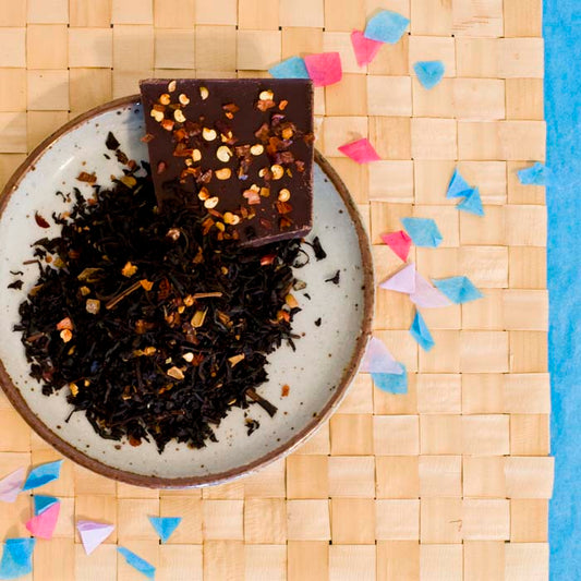 "Organic Mexican Chocolate Tea blend in a cup" "Ingredients of Organic Mexican Chocolate Tea: black tea, cinnamon, chilis" "Steeping Organic Mexican Chocolate Tea"