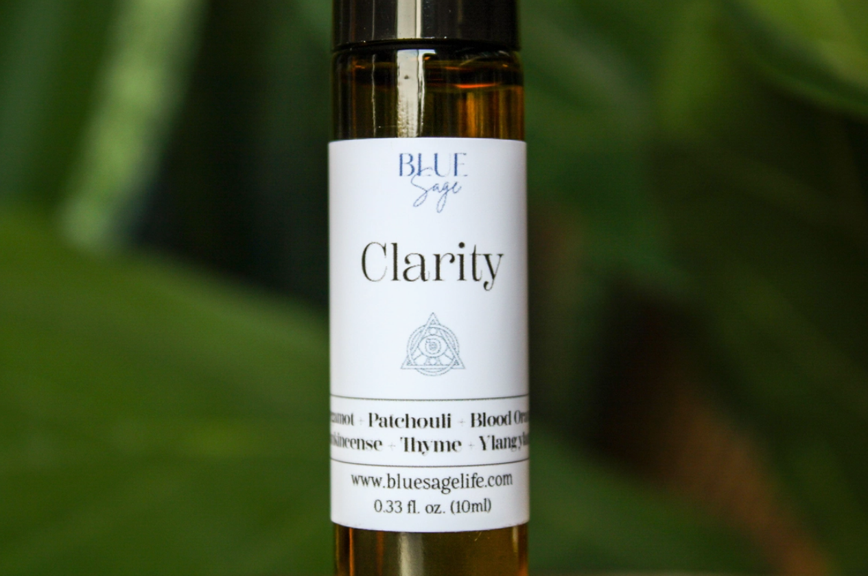 Clarity Essential Oil Roller Blend bottle Close-up of Clarity Roller Blend ingredients Application of Clarity Essential Oil Roller Blend on wrist 10ml Clarity Essential Oil Roller bottle packaging