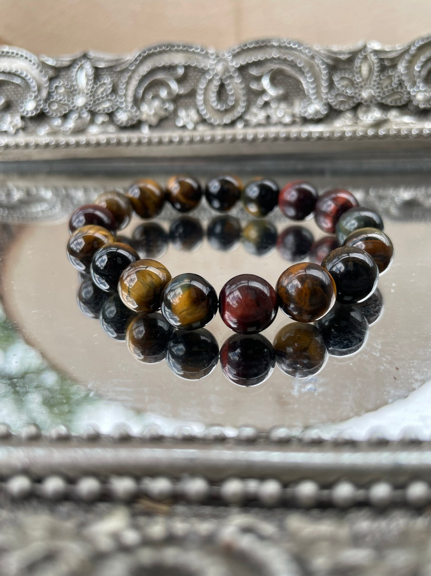 Handmade Tiger’s Eye bracelet displayed with polished brown and golden beads, symbolizing strength, grounding energy, and chakra alignment