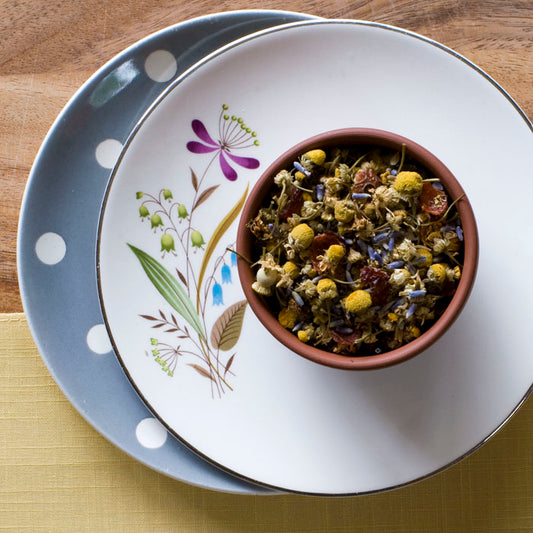 Organic Chamomile Lavender tea in a cup Chamomile flowers and lavender petals Steaming cup of chamomile lavender tea Organic Chamomile Lavender Herbal Tea packaging